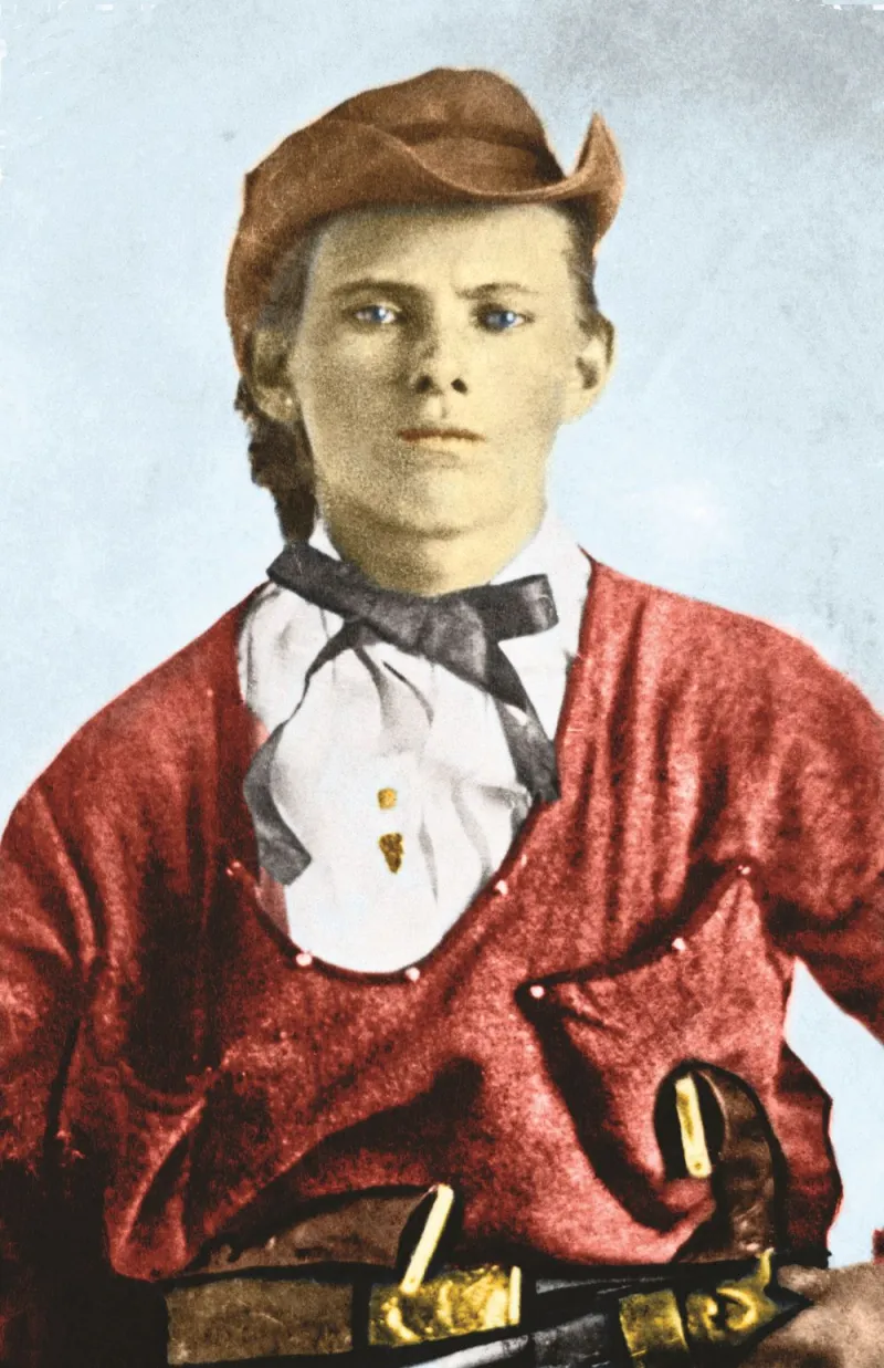 Colorized portrait of a young Jesse James in a red shirt and hat